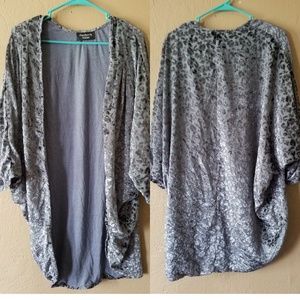 Feathers by Tolani Shrug